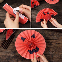 Set of 9 Jack-o'-Lantern Paper Fan Rosettes | 11.5" Halloween Party Backdrop